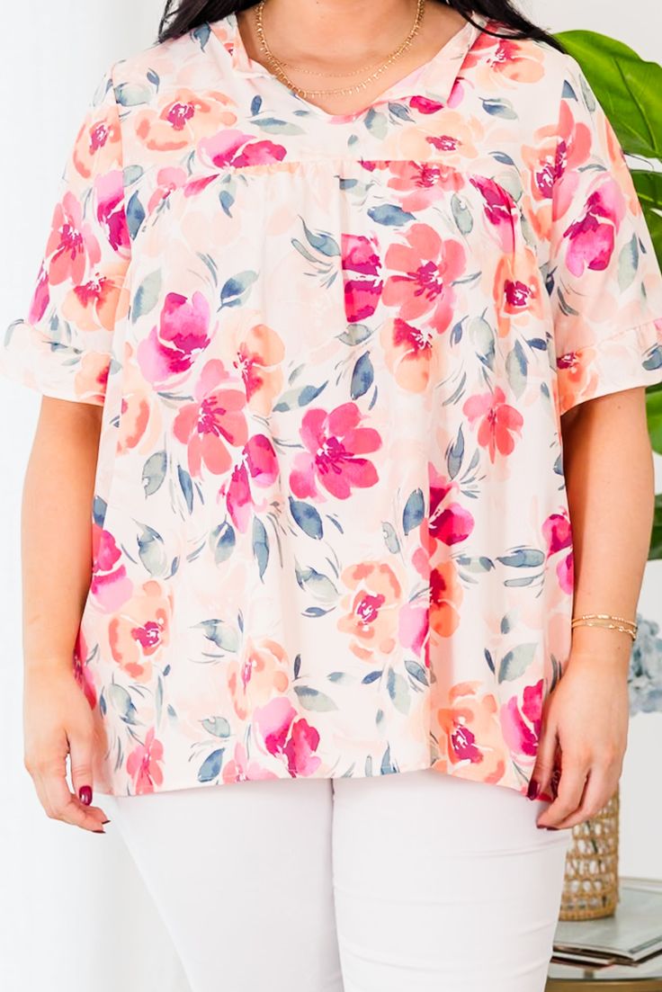 Grab this beauty while you still have a chance! This top features a lovely floral pattern and a pretty peach coral color that is sure to stand out! The flowy fit makes it perfect for a casual day out! 100% Polyester Feminine Peach Tops For Beach, Feminine Peach Tops For The Beach, Casual Peach Blouse For Brunch, Peach Feminine Blouse For Day Out, Feminine Peach Blouse For Day Out, Peach Blouse For Beach, Spring Season, Peach Blouse For Beach In Spring, Peach Blouse For Spring Beach Occasions, Casual Peach Blouse For Beach