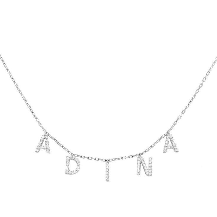 BLOCK NAME NECKLACE: Add a personal touch to your favorite outfit with Adina Eden's Block Name Necklace, featuring CZ-stone adorned upper-case block letter pendants of your choosing that sits easily on a delicate chain that finishes off this personalized name necklace . This eye-catching cute name necklace makes a perfect companion to a layered pendant necklace look that you can rock on your next day out with the girls. These silver name necklaces and gold name necklaces will finish off your loo Cute Name, Name Necklace Silver, Name Necklaces, Block Letters, Sparkle Necklace, Gold Name Necklace, Handmade Jewelry Gift, Rock On, Delicate Chain