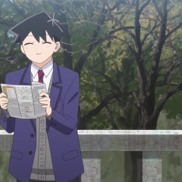 a man in a suit and tie is reading a newspaper while standing next to trees