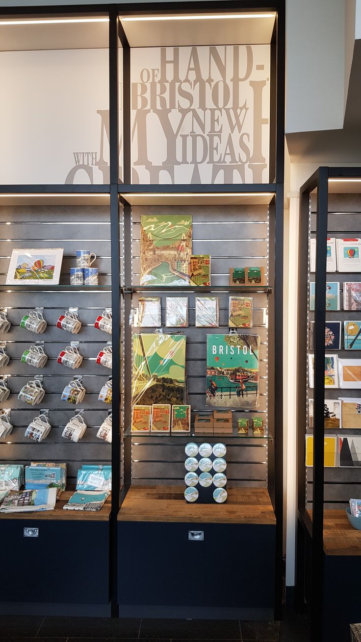 the display case is filled with books and cards