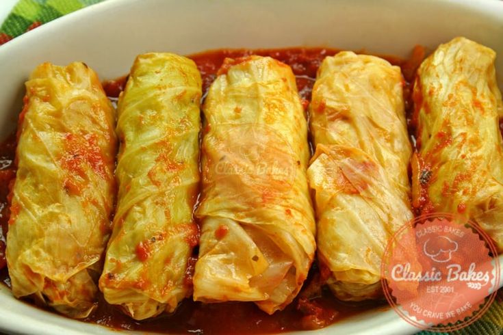 Savor the flavors of global cuisine with these Low Carb Cabbage Rolls! Packed with ground meat, herbs, and simmered in a light tomato sauce—delicious and healthy! Holubtsi Recipe, Grandmothers Kitchen, Cabbage Roll, Cabbage Rolls Recipe, Cooked Cabbage, Ukrainian Recipes, Cabbage Rolls, Cabbage Recipes, Russian Recipes