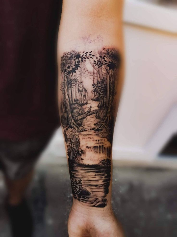 a person with a tattoo on their arm