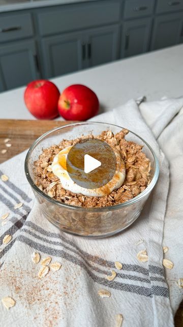 an apple and oatmeal dish on a kitchen counter