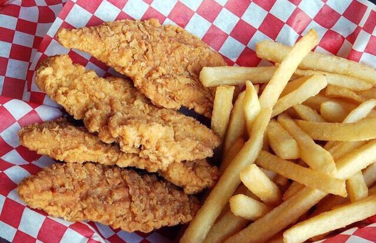 fried chicken and french fries in a basket