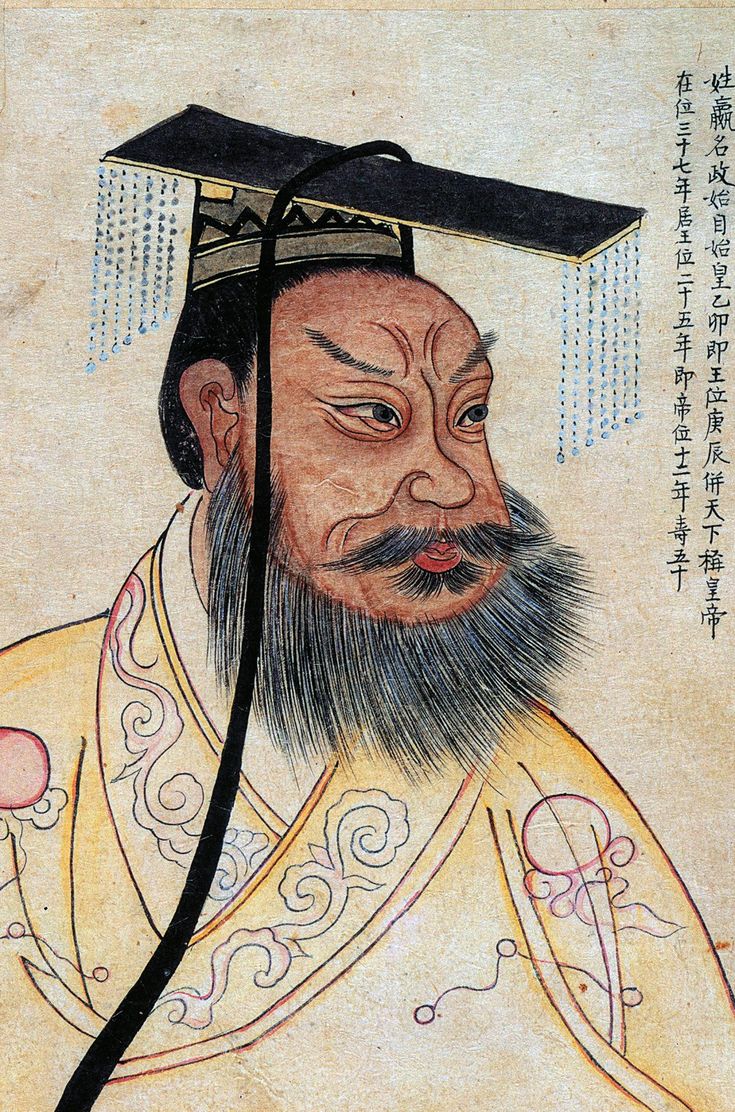 an old chinese painting with a man wearing a hat