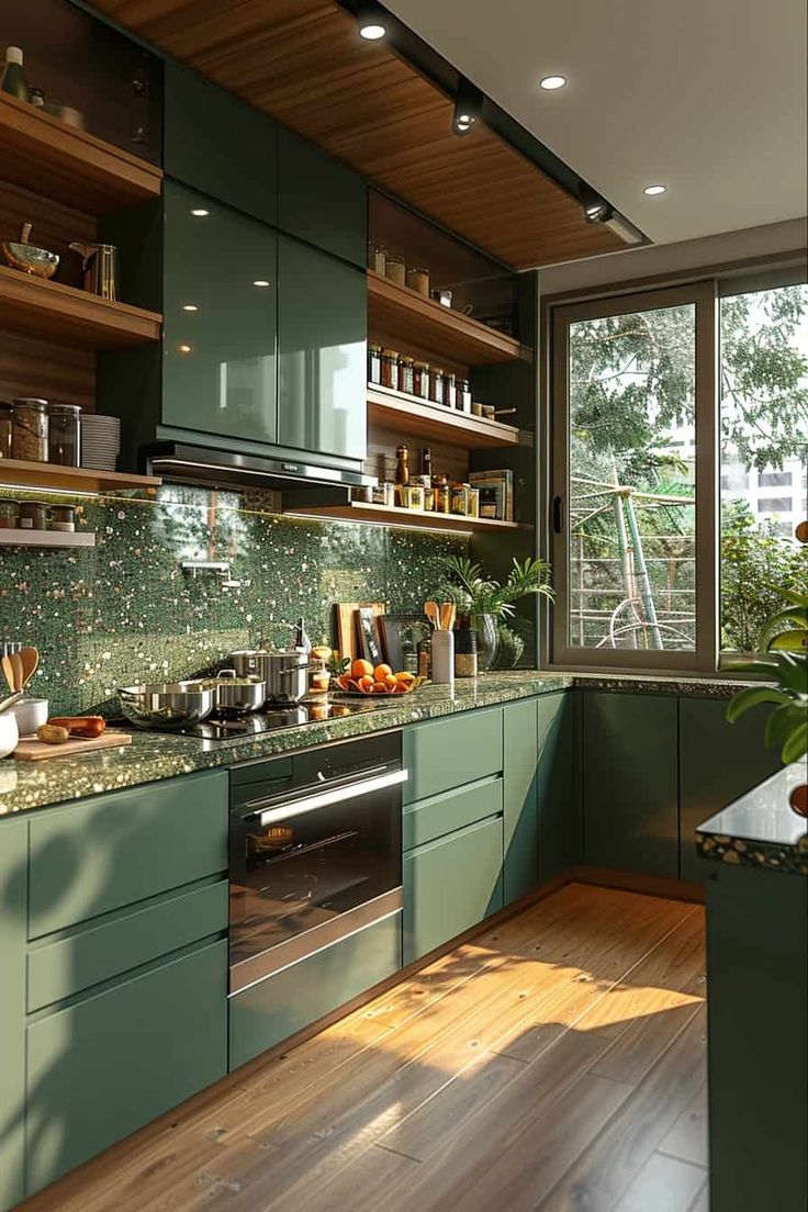 a kitchen with green cabinets and wooden floors is pictured in this image, there are plants on the counter