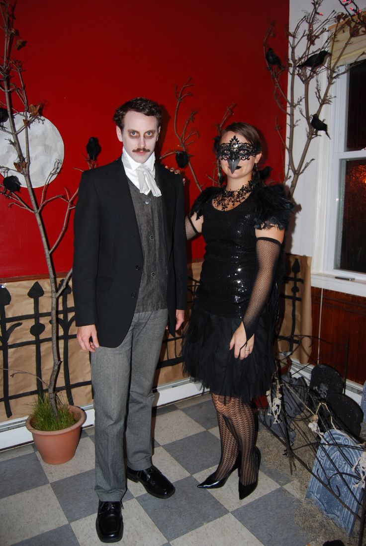 a man and woman dressed up in costumes