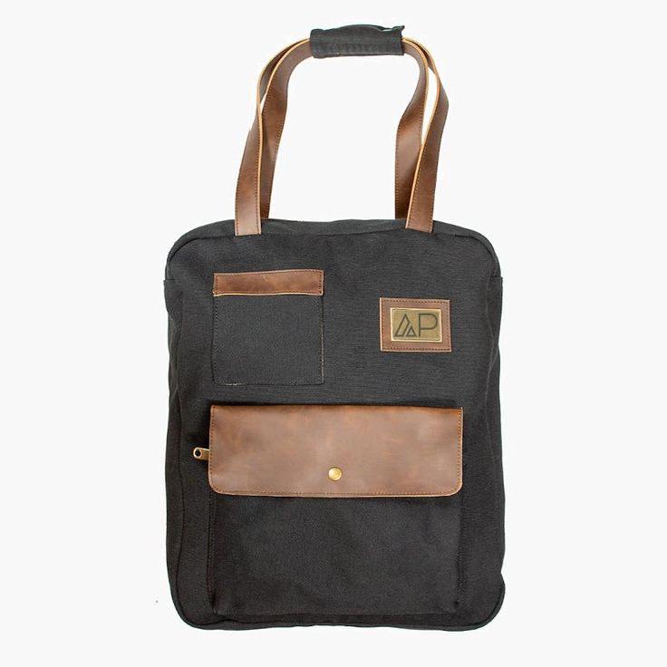 Black Turlee Tote Large Capacity Tote Backpack For On-the-go, Urban Canvas Backpack, Canvas Tote Backpack With Top Carry Handle, Canvas Travel Bag With Top Carry Handle, Black Rectangular Canvas Backpack, Canvas Satchel With Top Handle For School, Canvas Satchel With Top Carry Handle For School, Canvas Backpack With Top Carry Handle, School Satchel With Top Carry Handle In Canvas