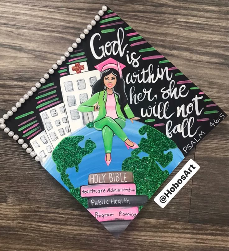 a graduation cap with the words god is within her she will not fall