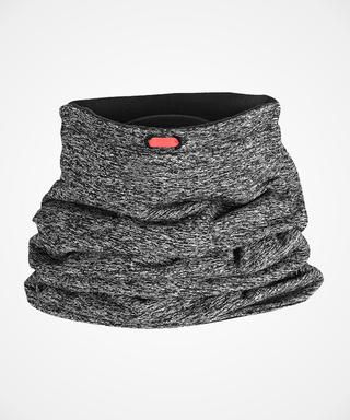 a black and white photo of a neck gaiter with a red button on it