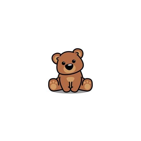 a brown teddy bear sitting on the ground