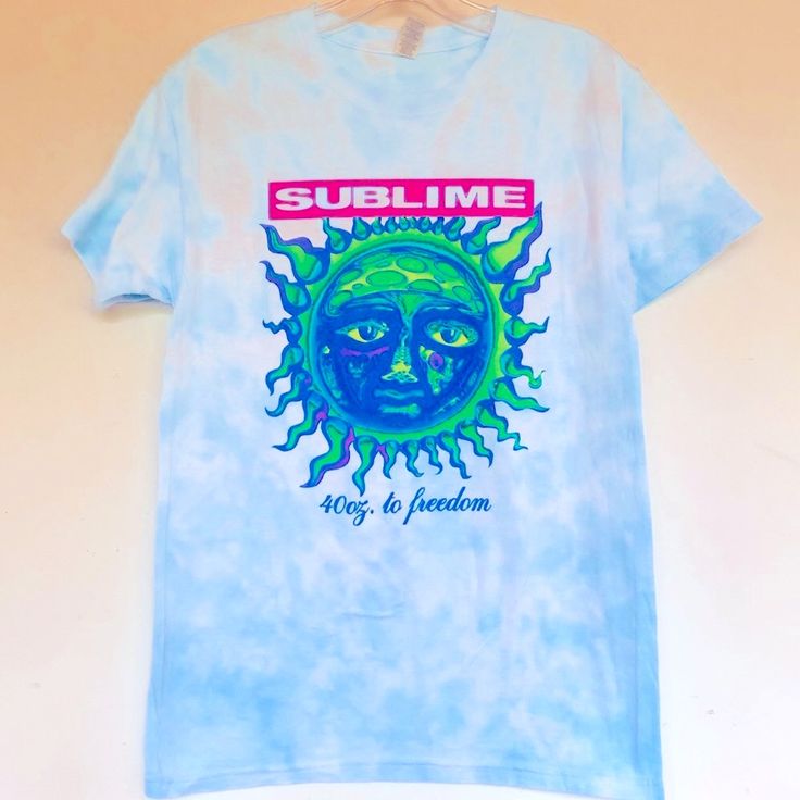 Sublime Classic Sun Tie Dye Tee Shirt Sublime Tie Dye Tee Shirt Tie-Dye Sublime Tee With Classic Sun 40oz To Freedom Graphic At The Front. Cotton Is Cut In A Short Sleeve Silhouette And Topped With A Rib-Knit Crew Neck For A Comfortable Wear. Unisex Fit, Fits Men And Women - 100% Cotton - Machine Wash - Imported Authentic Officially Licensed! Printed In The Usa Size Small Chest 18” Length 27” Sublime Classic Sun Tie Dye Graphic Tee Printed Tie Dye T-shirt For Summer, Summer Tie-dye Printed T-shirt, Tie Dye Tops With Sublimation Print For Summer, Summer Tie Dye Shirt With Graphic Print, Tie Dye T-shirt For Summer, Summer Tie-dye T-shirt, Light Blue Crew Neck Shirt For Summer, Green Crew Neck Summer Shirt, Green Crew Neck Shirt For Summer