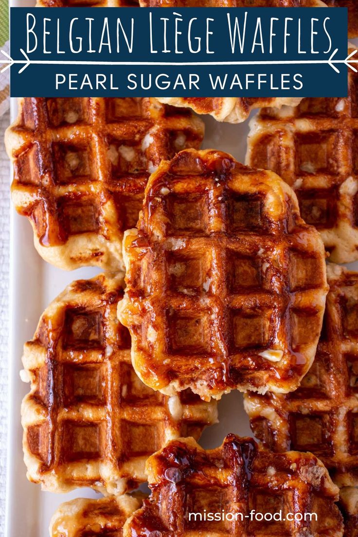 some waffles are sitting on a white plate