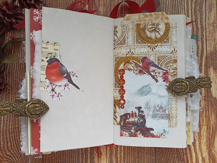 an open christmas card book with birds on it