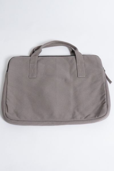 Whether you’re a minimalist who likes to do more with less, or you’re a maximalist tired of digging your laptop out of a jam-packed backpack or bag, our new Laptop Sleeve with handles will help you get a handle on staying organized and on the move. Made with 14-oz organic cotton canvas and padded with organic cotton fiber for padding and softness, our eco-friendly laptop sleeves are made to protect your machine from the jostling, grit, and abrasion of transport in a backpack or tote. Designed to New Laptop, New Laptops, Backpacking Packing, Laptop Case, Staying Organized, Laptop Sleeve, Do More, Laptop Sleeves, Cotton Fiber