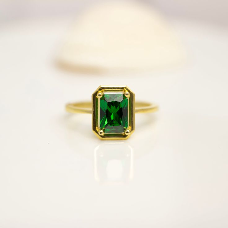 Gift jewelry suitable for Mother, Sister, Wife or Girlfriend for special occasions such as birthday, anniversary, graduation, valentine's day, Christmas or new year  Your new  Octagon Cut Emerald ring is gorgeous! The details of the solid gold handmade Octagon Cut Emerald ring are quite eye-catching. A great gift for you and anyone who loves jewelry. This jewelry, which is ideal for daily use and an indispensable part of you, can make your loved ones happy with these accessories. RİNG FEATURES *Made to Order. *Material: Solid Gold (Real Gold, Not Gold Plated Or Gold Filled Material) *Gold Color: Yellow Gold, Rose Gold, White Gold *Gold Carat: 14K, 18K *Diamond Cut:  Octagon Cut  *Diamond Size : 7x5  *Gemstone: Lab Emerald  Ready to Ship in 2-4 Business Days (Please note that during big sea Green 14k Gold Ring For Proposal, 14k Gold Emerald Ring As May Birthstone Gift, 14k Gold Emerald-cut Birthstone Ring For Anniversary, 14k Gold Emerald Ring Gift For May Birthstone, 14k Gold Birthstone Ring For Anniversary, Emerald Cut, Emerald Cut Birthstone Ring In 14k Gold For Anniversary, Classic Diamond Ring For Proposal With May Birthstone, Classic Emerald Cut Birthstone Ring For Gift, Gold Emerald Ring For Proposal