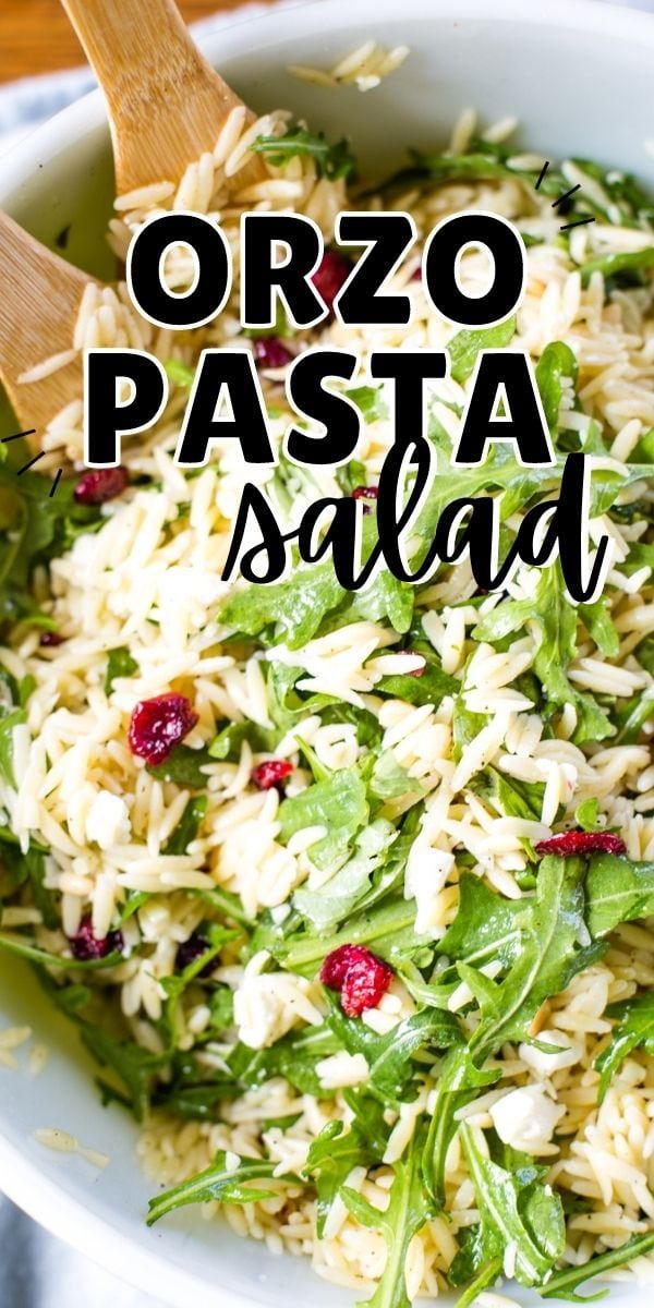 a white bowl filled with rice and spinach salad