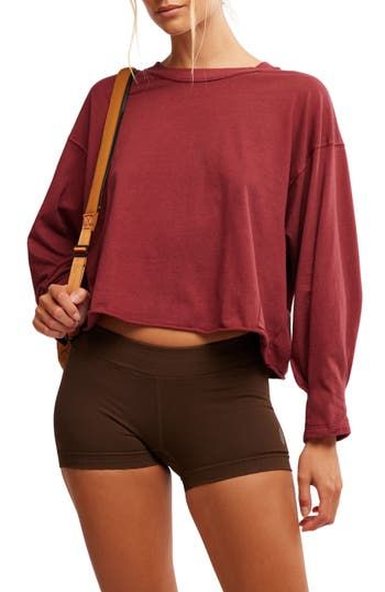 Love to layer in this soft cotton top designed with a classic crewneck and dropped shoulders. 21 1/2" length (size Medium) Crewneck Long sleeves 100% cotton Machine wash, tumble dry By Free People; imported Cotton Tops Designs, Sour Cherry, Layer Top, Fp Movement, Cotton Top, Cotton Tops, Tops Designs, Free People, Cherry