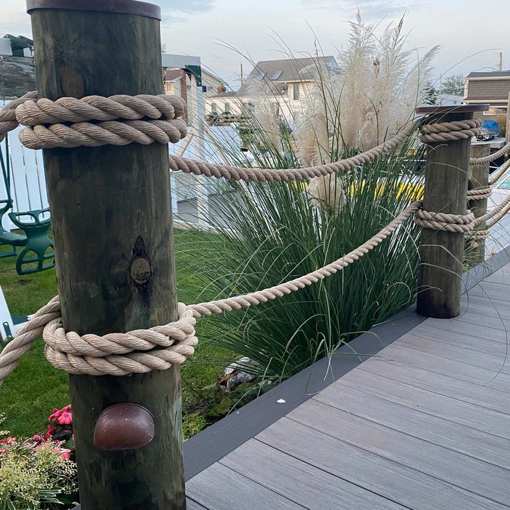 the rope is attached to the wooden posts