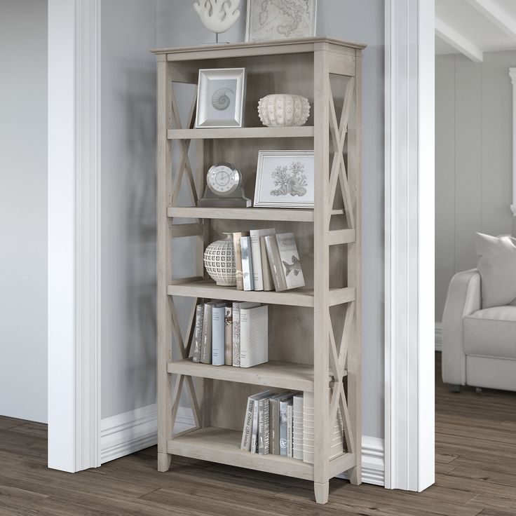 a book shelf in the corner of a room