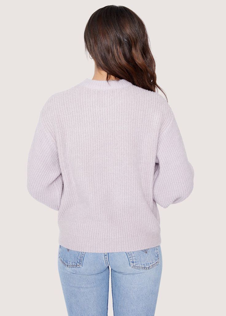 During those cool days out! Its perfect shade of lilac give this sweater a unique look, and make it easy to pair with your favorite jeans for a casual look, or over a skirt for something more dressed up. Imported 77% Acrylic, 20% Nylon, 3% Spandex Model is 5 ft 9.5 inches; Bust: 33", Waist: 27.5", Hips: 39" and wearing a size Small Runs true to size Hand wash or wash with gentle cycle with cold water with like colors, Air dry to avoid shrinkage Purple Sweater With Ribbed Cuffs For Spring, Lavender Knit Sweater For Fall, Heather Winter Sweater For Loungewear, Heather Winter Loungewear Sweater, Cozy Lavender Sweater For Fall, Trendy Lavender Winter Tops, Cozy Lavender Fall Sweater, Trendy Lavender Tops For Winter, Lavender Crew Neck Sweater For Fall