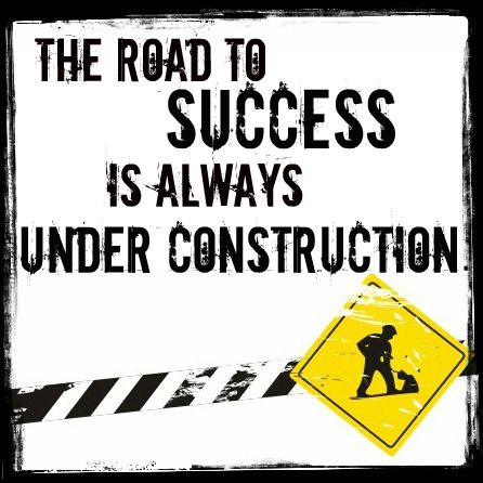 there is a sign that says the road to success is always under construction on it