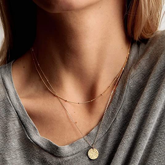 Best Seller - Handmade This 14K Gold Filled Moon Hammered Coin Layered Necklace has a stunning dainty look with a minimalist boho style that is perfect for daily wear or layering. Can easily be worn alone or layered with other necklaces. Great treat for yourself or makes a sentimental surprise for a special someone. Measurements 15" long with a 2 inch extender. Adjustable for perfect fit. 14mm coin disc hammered pendant Details 14K Gold Filled with Brass to Ensure a Long Lasting Finish Nickel Fr Bohemian Clavicle Chain Jewelry For Everyday, Bohemian Everyday Clavicle Chain Jewelry, Minimalist Layered Necklace With Adjustable Chain, Trendy Layered Necklace With Delicate Chain, Layering Coin Necklace With Adjustable Chain, Bohemian Jewelry With Delicate Chain For Everyday, Everyday Bohemian Jewelry With Delicate Chain, Minimalist Layered Charm Necklaces, Bohemian Pendant Clavicle Chain Layered Necklace