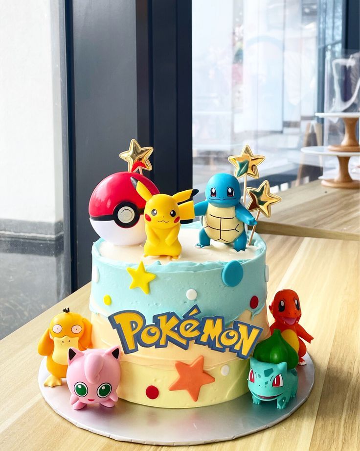 a pokemon themed birthday cake on a table