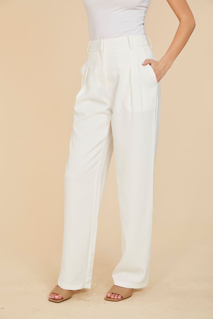 Our Pleated Wide Leg Trouser is a seamless blend of sophistication and comfort. These stylish trousers boast elegant pleats and a wide-leg design, as well as a hidden front closure for a clean look. While it’s certainly considered a power dressing staple, these stylish pants are great for both professional settings and chic casual occasions. Make a statement with a silhouette that commands attention, allowing you to conquer any occasion with confidence and flair. Wide leg Pleats Hidden front clo Elegant White Wide Leg Pants For Business Casual, Elegant White Wide Leg Pants With Pressed Crease, White Wide Leg Pants With Pressed Crease For Work, Formal White Wide Leg Pants With Pressed Crease, White Pleated Bottoms For Formal Occasions, Elegant Pleated Wide Leg Pants For Work, Elegant Pleated Dress Pants With Tapered Leg, Formal White Pleated Bottoms, Elegant Pleated Tapered Leg Dress Pants