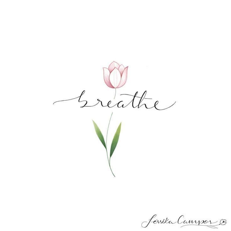 a pink flower with the word breathe written on it