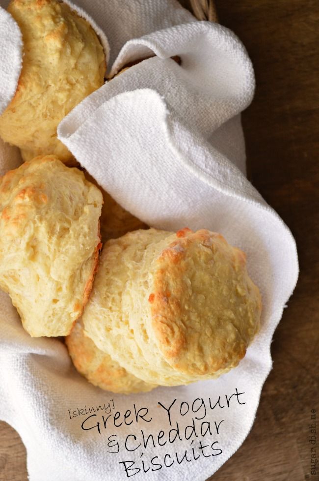 three biscuits sitting on top of a white towel