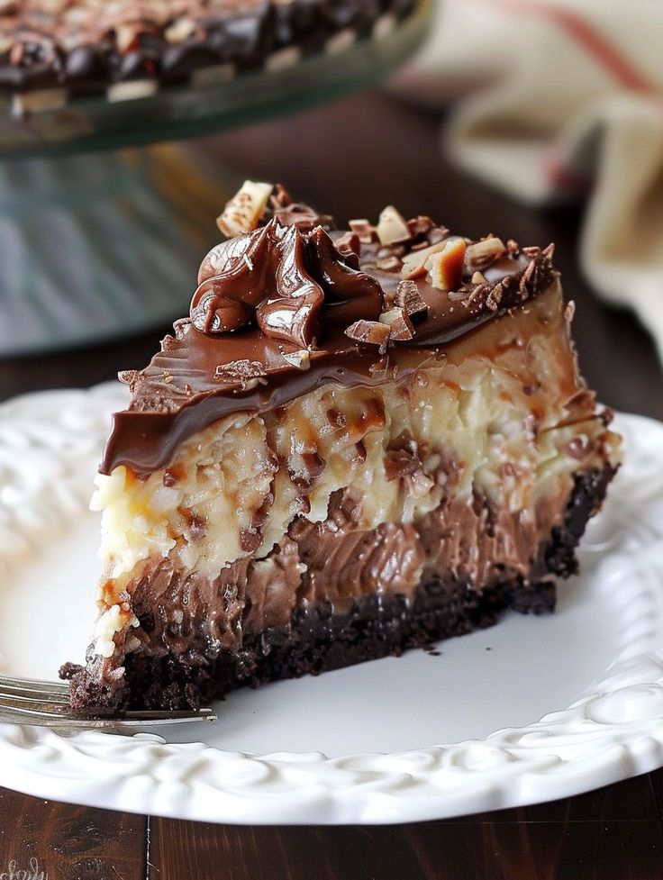 a piece of chocolate cheesecake on a plate with a fork