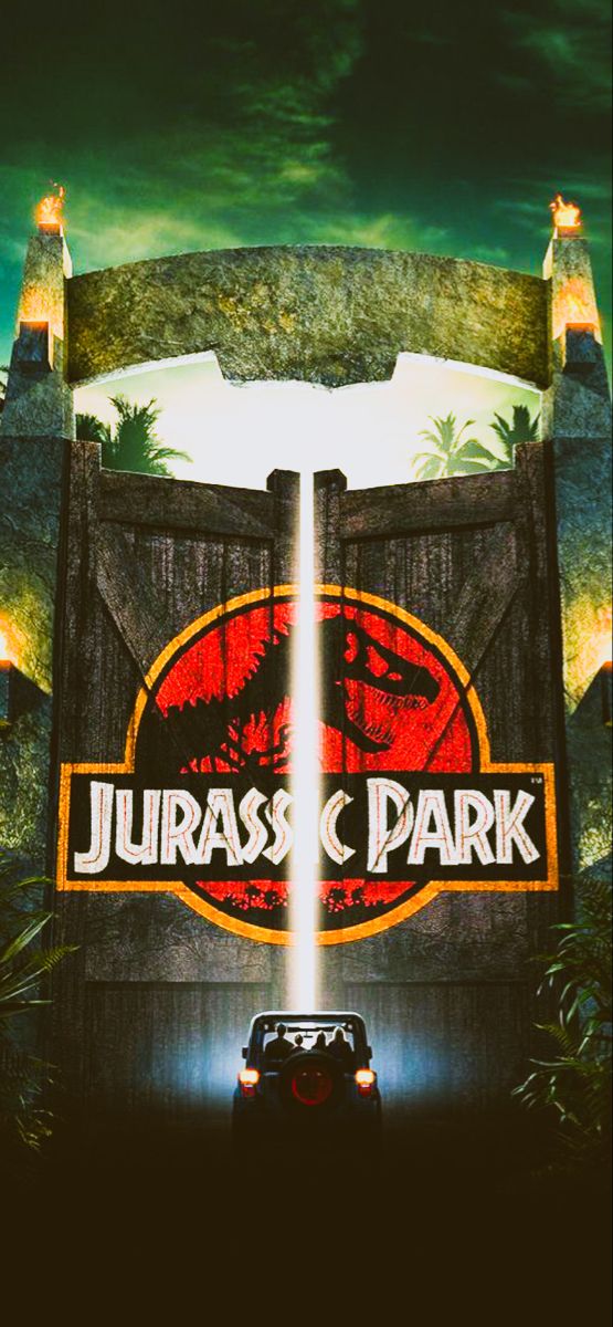 a car driving past a sign for the entrance to a park with dinosaurs on it