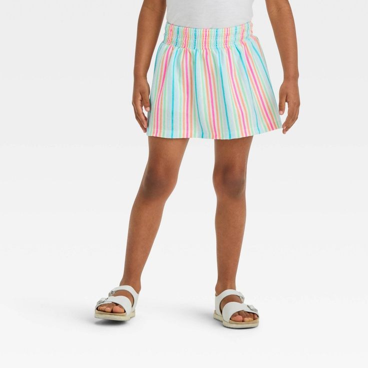 Your little one will move in comfort and style wearing this Mid-Rise Skirt from Cat & Jack™. Crafted from cotton-blend jersey fabric, this regular-fit skirt offers them all-day cool comfort, and it's designed with a full elastic waistband to offer them a secure fit. Falling above the knee, they can pair it with a variety of tees, tanks or sweatshirts for versatile outfit options. Cat & Jack™: Kids’ clothing with an imagination of its own. Playful Elastic Bottoms For Spring, Casual Elastic School Bottoms, Casual Elastic Bottoms For School, Playful Elastic Summer Bottoms, Playful Elastic Bottoms For Summer, Multicolor Bottoms For School In Summer, Playful Bottoms For School In Spring, Cute Striped Bottoms For Spring, Cute Multicolor Bottoms With Elastic Waistband