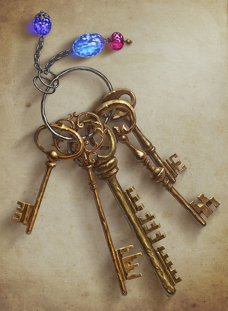 several antique keys are attached to a chain