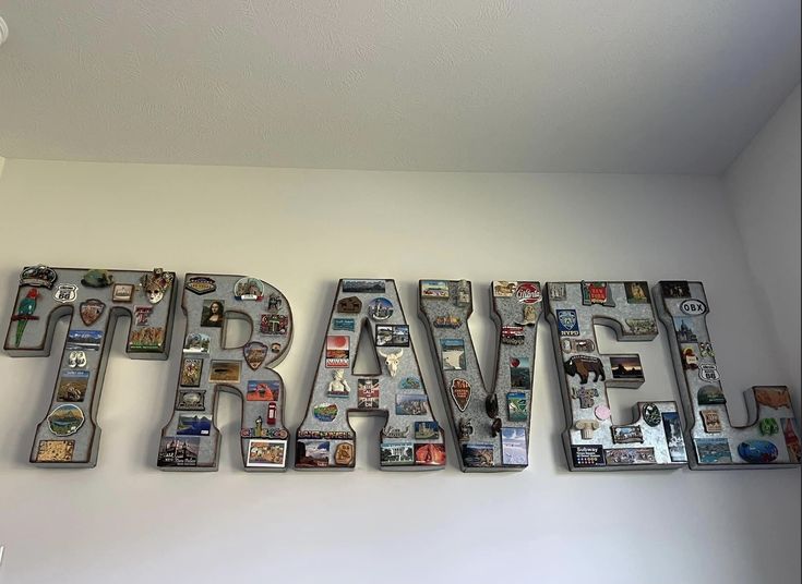 the word travel is made up of many different types of magnets on the wall