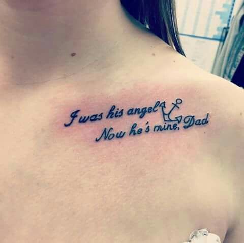 a woman with a tattoo on her chest that says, i was his angel and you're mine dad