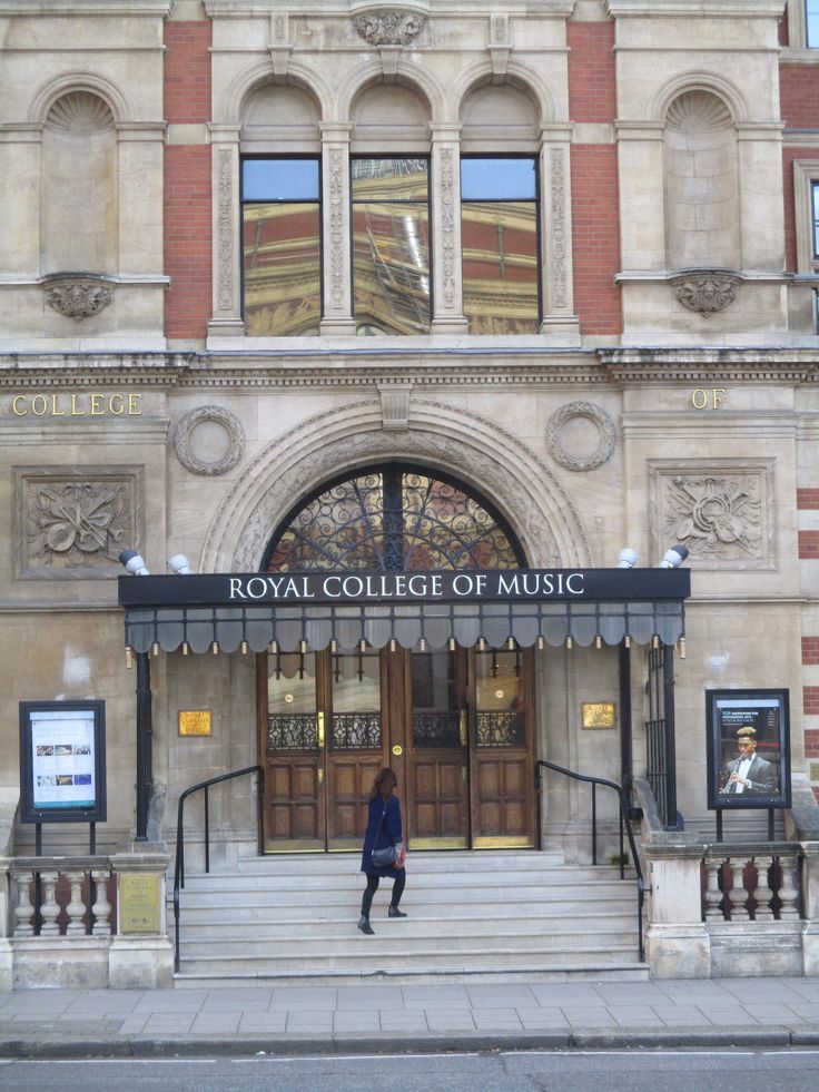 the royal college of music is located in an old brick building with arched doorways