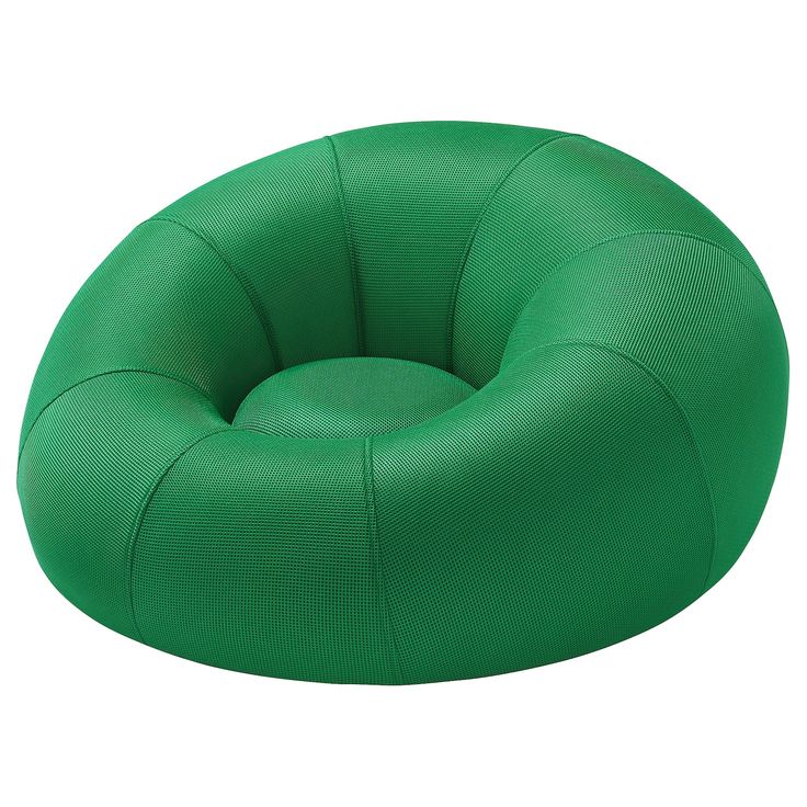 a green bean bag chair sitting on top of a white floor