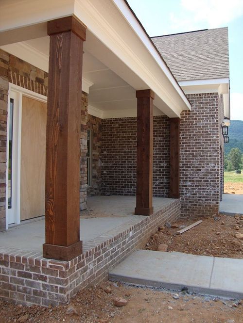 the front porch of a house under construction