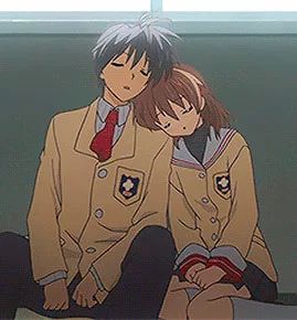 an anime scene with two people sitting next to each other and one is holding his head