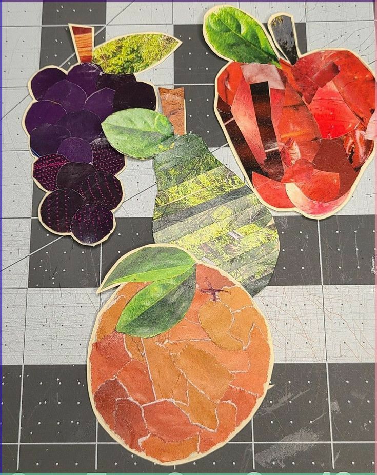 three pieces of paper cut out to look like fruit