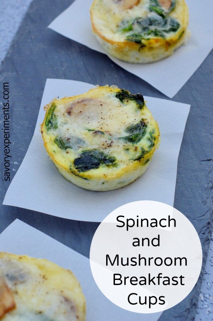 spinach and mushroom breakfast cups on top of paper