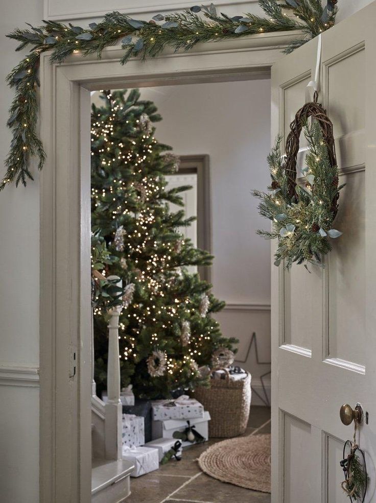 a christmas tree is hanging on the door