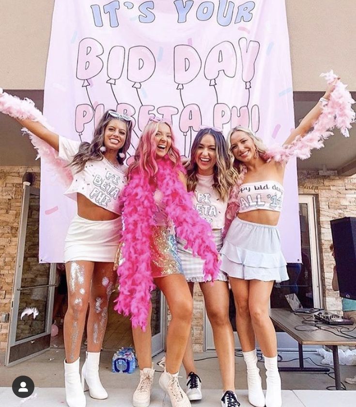 three women in pink and white cheerleader outfits posing for a photo with a sign that says party like it's your bad day