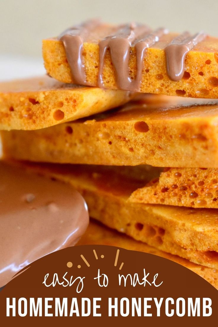 homemade honeycomb crackers stacked on top of each other with chocolate drizzle