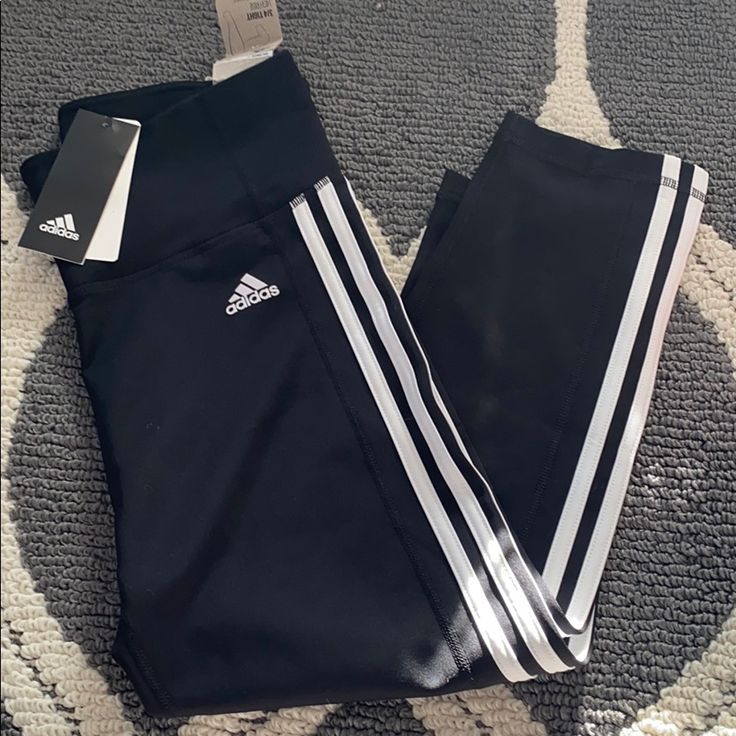 Brand New With Tags 3/4 Length Black Sports Capris For Spring, Black Capris For Sports In Spring, Adidas Black Athleisure Leggings, Black Sporty Capri Length Leggings, Black Sporty Capri-length Leggings, Black Capri Length Leggings For Spring, Adidas Stretch Black Leggings, Adidas Black Stretch Leggings, Black Stretch Adidas Leggings