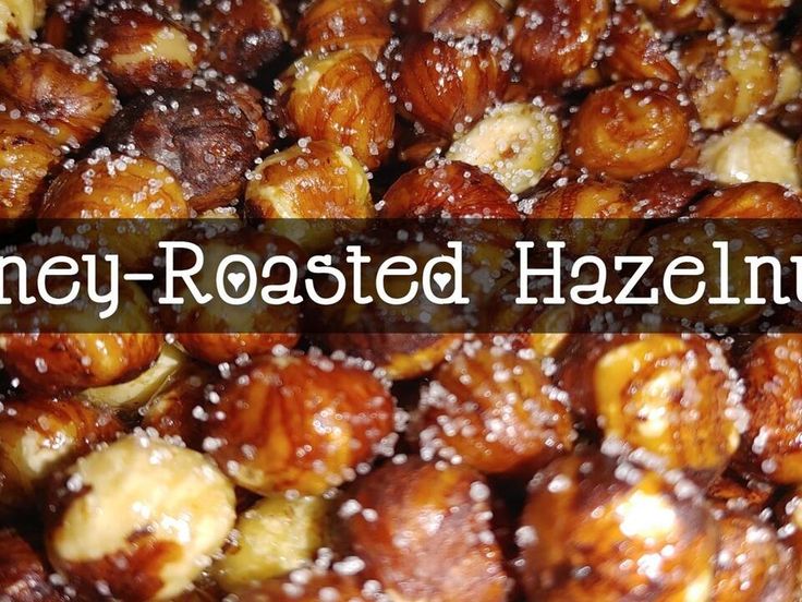 the words honey roasted hazelnuts are overlaid with nuts