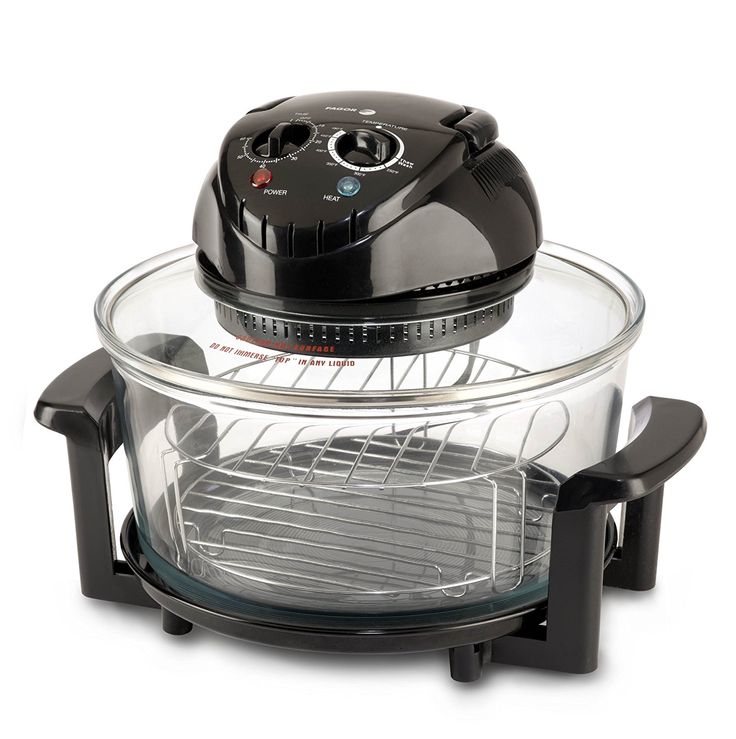 an electric food cooker sitting on top of a table