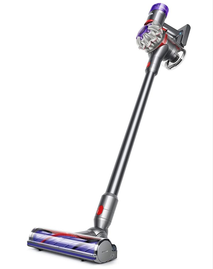 a silver and red vacuum cleaner on a white background